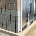 Installing 3-inch insulation board